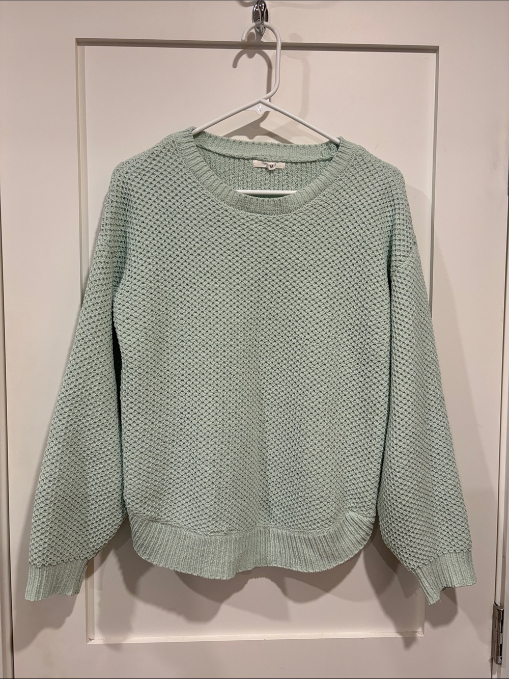 Maurice’s mint green sweater